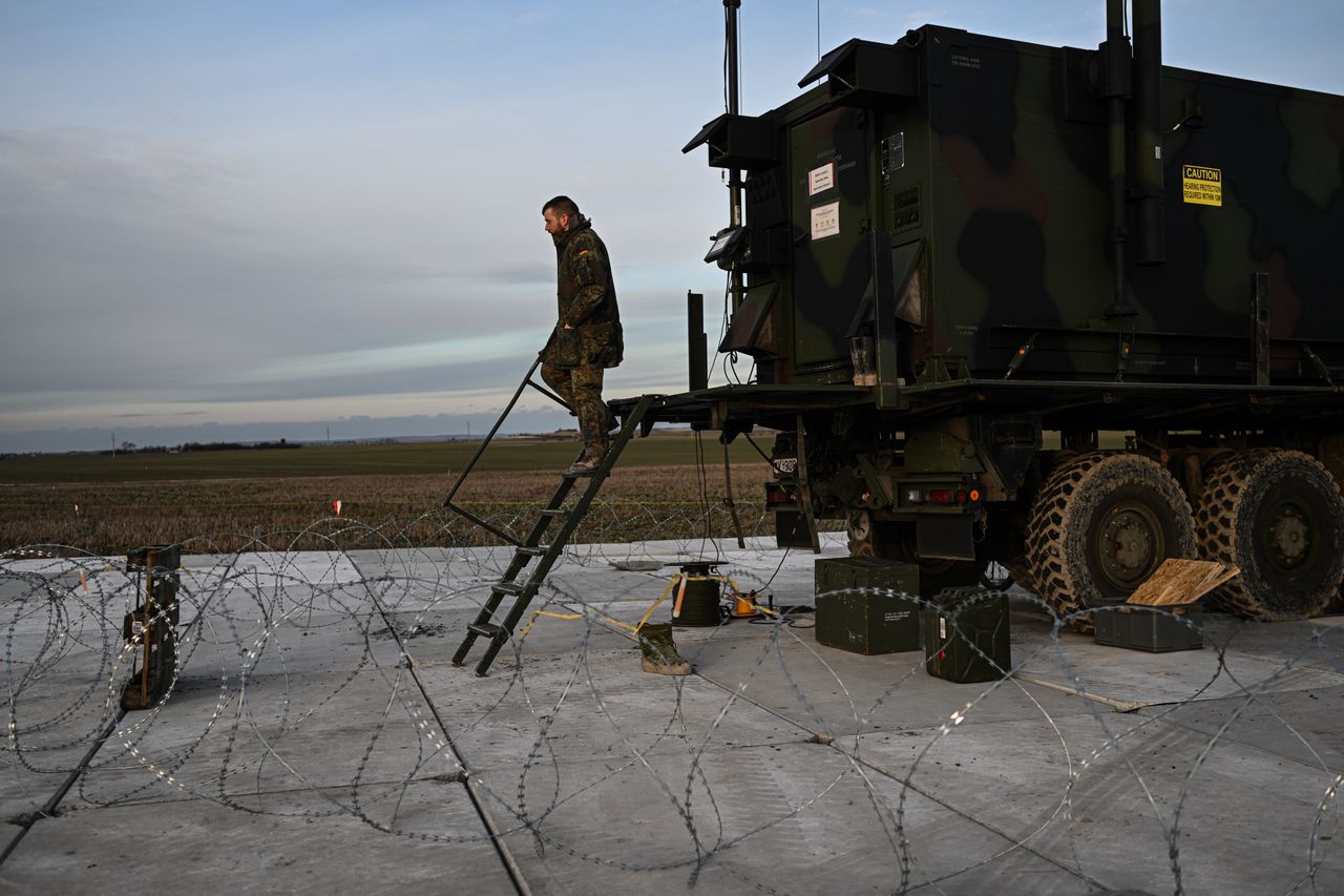 ZAMOSC, POLAND - FEBRUARY 18: A German soldier stands on the radar module of the US made MIM-104 Patriot surface-to-air missile (SAM) system on February 18, 2023 in Zamosc, Poland. The German armed forces deployed Patriots batteries to their NATO neighbor, after a missile explosion in Przewodow, which previous investigation suggests that came from Ukrainian air defense, killed two civilians. Since Russia's large scale military attack on Ukraine on February 24, 2022 more than 9.7 million refugees from Ukraine crossed the Polish borders to escape the conflict, with 1.4 million registering in Poland whilst others moved on to other countries. (Photo by Omar Marques/Getty Images)