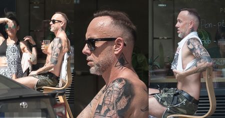 Bladolicy Adam "Nergal" Darski opala GOŁĄ KLATĘ w obecności tajemniczej towarzyszki (ZDJĘCIA)