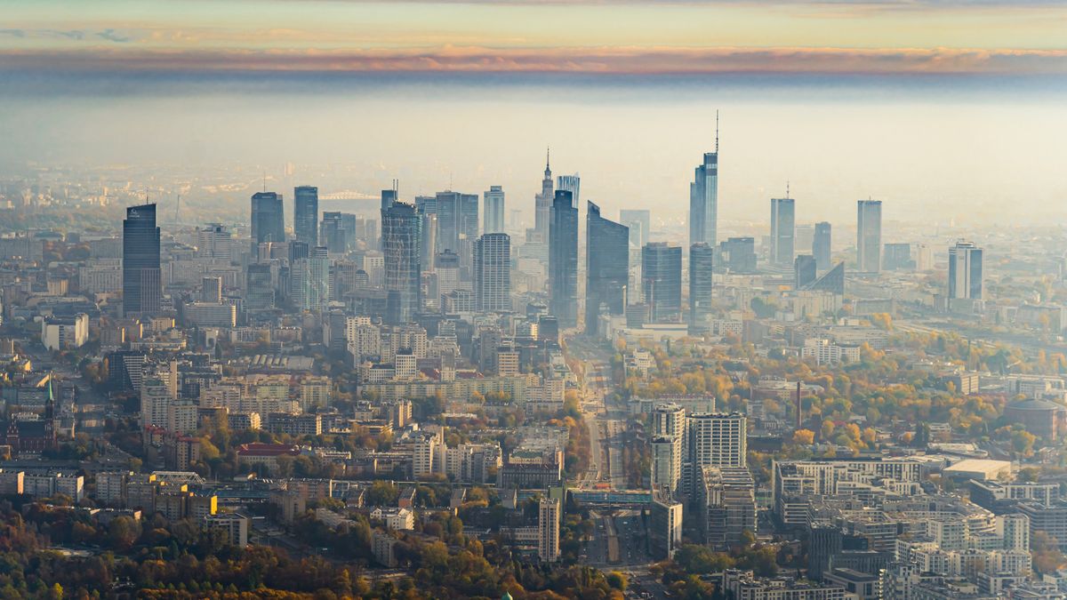 Stunning aerial view of downtown Warsaw from plane window. Autumn morning. Sunrise with fog over the city. Modern skyscrapers.Stunning aerial view of downtown Warsaw from plane window. Autumn morning. Sunrise with fog over the city. Modern skyscrapers. High quality photoeye, exterior, aircraft, panoramic, international, capital cities, district, office, tower, downtown, business, aerial view, fast, modern, town, development, flight, outdoors, capital, trip, financial, fog, transportation, window, city life, skyline, horizon, skyscraper, warsaw, high, poland, polish, airplane, housing, urban, road, photography, fly, cloudscape, estate, pass, corporation, jet, light, passenger, horizontal, sky, infrastructure, center, downtown district, eye, exterior, aircraft, panoramic, international, capital cities, district, office, tower, downtown, business, aerial view, fast, modern, town, development, flight, outdoors, capital, trip, financial, fog, transportation, window, city life, skyline, horizon, skyscraper, warsaw, high, poland, polish, airplane, housing, urban, road, photography, fly, cloudscape, estate, pass, corporation, jet, light, passenger, horizontal, sky, infrastructure, center, downtown district