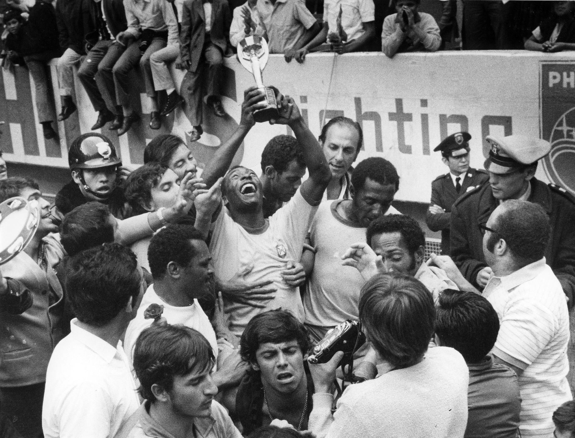 1970 FIFA World Cup in Mexico Pele (Edson Arantes do Nascimento) 1940 - Brazilian football player, 1994 Minister of Sports in Brazil - Celebrating Pele, surrounded by teammates, is raising the Jues Rimet Trophy after beating Italy in the final - June
(GERMANY OUT) 1970 FIFA World Cup in Mexico Pele (Edson Arantes do Nascimento) 1940 - Brazilian football player, 1994 Minister of Sports in Brazil - Celebrating Pele, surrounded by teammates, is raising the Jues Rimet Trophy after beating Italy in the final - June 1970 (Photo by Horstmüller/ullstein bild via Getty Images)
ullstein bild