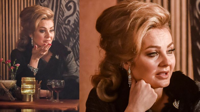 Ufryzowana Małgorzata Socha nad goździkiem na planie serialu "Stulecie winnych"