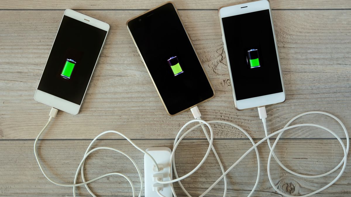 Smartphones are charged from the charger and lie side by side
Smartphones are charged from the charger and lie side by side on the table. Charger for phone with connected USB cables, wires with smartphones.
Andrei Sauko
charger, powerbank