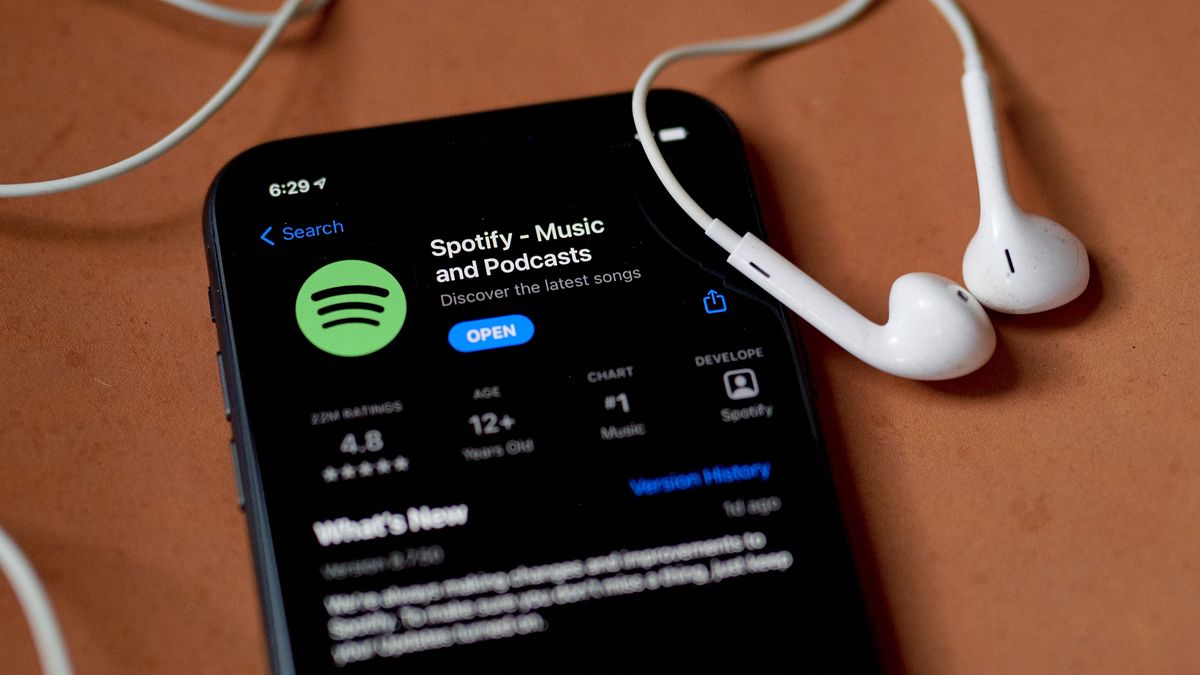 The Spotify application for download in the Apple App Store on a smartphone arranged in the Brooklyn borough of New York, US, on Friday, July 22, 2022. Spotify Technology SA is scheduled to release earnings figures on July 27. Photographer: Gabby Jones/Bloomberg via Getty Images