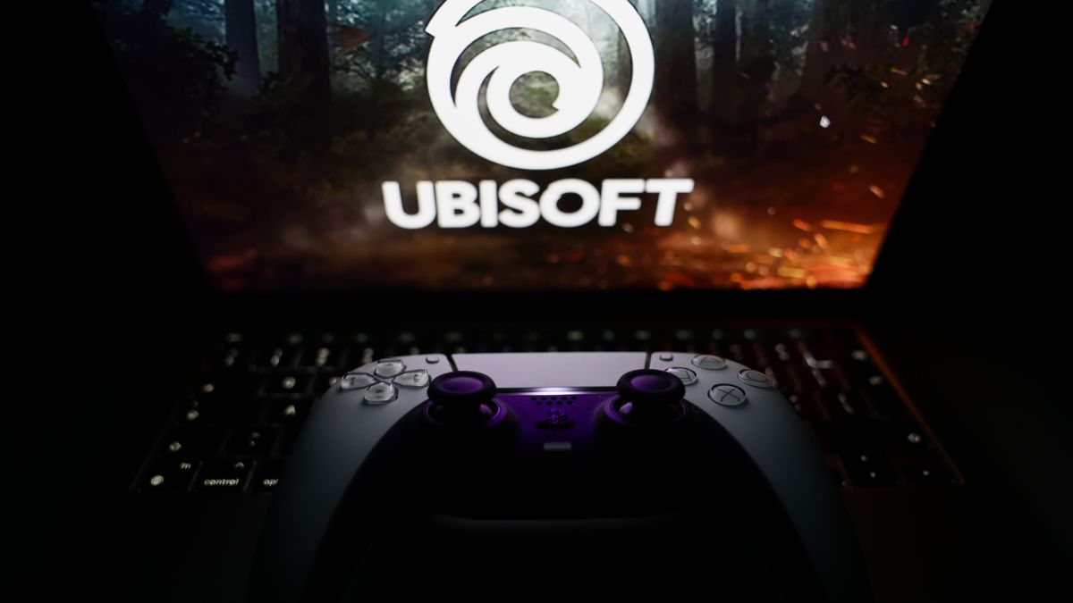 Ubisoft logo displayed on a laptop screen and DualSense controller are seen in this illustration photo taken in Krakow, Poland on October 23, 2024. (Photo by Jakub Porzycki/NurPhoto via Getty Images)