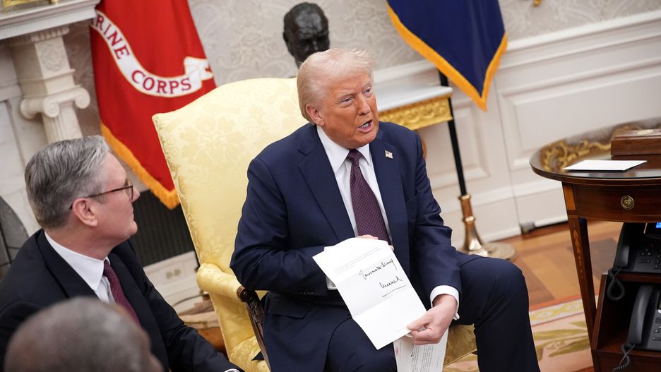 WASHINGTON, DC - FEBRUARY 27: British Prime Minister Keir Starmer (L) presents a letter from King Charles III to U.S. President Donald Trump as the two meet in the Oval Office at the White House on February 27, 2025 in Washington, DC. Starmer is on his first visit to Washington since President Trump returned to the White House. Starmer's trip comes shortly after he announced an increase in UK defense spending, ostensibly as a signal to Trump that the UK is prepared to bolster Europe's security, and as he aims to broker a fair peace deal for Ukraine amid Trump's warming relations with Russia. (Photo by Andrew Harnik/Getty Images)