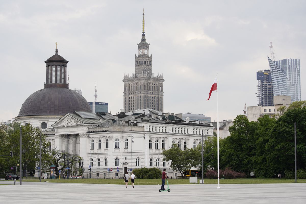 The Palace of Culture and Sciences is seen beyond buildings see from Pilsudski Square in Warsaw, Poland on May 11, 2020. In a press conference on Monady Polish Health Minister Lukasz Szumowski said he agrees with the letting people return to work despite the ongoing coronavirus epidemic. Consequences of not unfreezing the economy Szumowksi said would also be felt in the field of healthcare. (Photo by Jaap Arriens/NurPhoto via Getty Images)