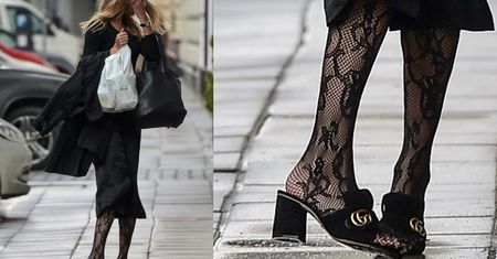 Frąckowiak w klapkach Gucci za 2200 złotych zasłania twarz przed paparazzi (ZDJĘCIA)