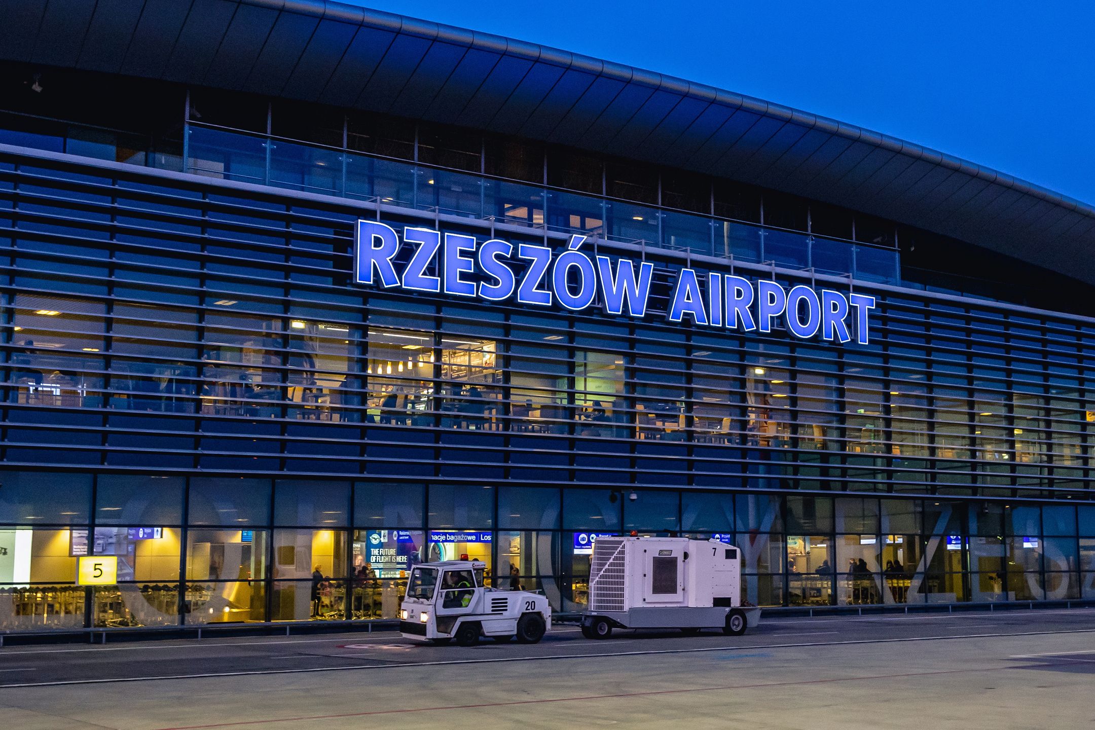 Jasionka, Poland - March 11, 2022: Terminal of airport in Jasionka village near Rzeszow city
Konrad Zelazowski
terminal, Airport, Rzeszow-Jasionka, Jasionka, Rzeszow, Poland, city, Polish, Podkarpackie, Subcarpathian, Voivodeship, Region, Subcarpathia, Province, Rzeszow County, international airport, transport, transportation, Apron, view, building, modern, architecture, exterior, outside, outdoor, evening, terminal, airport, rzeszow-jasionka, jasionka, rzeszow, poland, city, polish, podkarpackie, subcarpathian, voivodeship, region, subcarpathia, province, rzeszow county, international airport, transport, transportation, apron, view, building, modern, architecture, exterior, outside, outdoor, evening