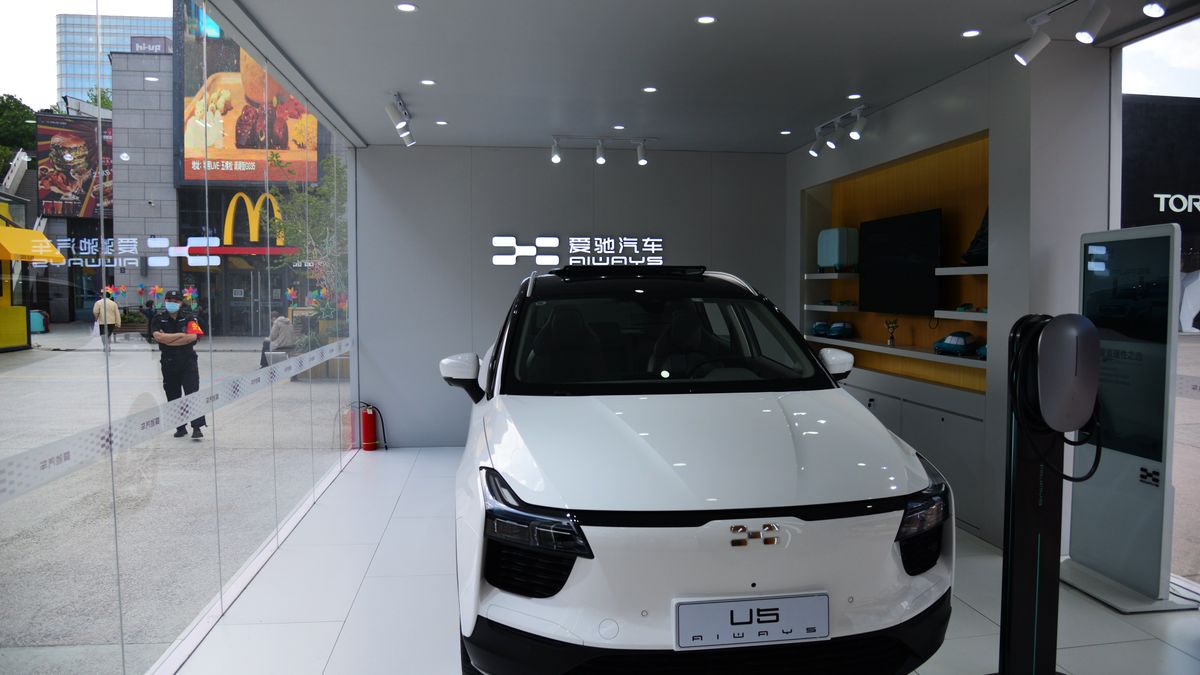 BEIJING, CHINA - APRIL 29, 2021 - Photo taken on April 29, 2021 shows the showroom of an Aiways electric vehicle at the Wukesong Huaxi Shopping Center in Beijing, China. On the same day, Aiways Automobile officially released news, its new pure electric SUV - Aiways U6 mass production version officially released, the trial version of the car will be off the production line in the middle of May this year, and its mass production version will be listed in the fourth quarter. (Photo credit should read Costfoto/Barcroft Media via Getty Images)