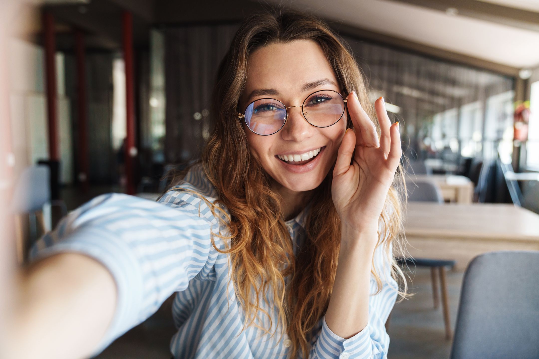 Image of happy beautiful woman in eyeglasses laughing and taking selfie photo in lecture room
portrait, woman, girl, modern, writing, notes, table, caucasian, alone, female, attractive, young, workplace, indoor, studying, learn, homework, student, charming, education, classroom, library, planner, eyeglasses, smiling, joyful, cheerful, pleased, happy, excited, selfie, photo, optimistic, positive, fun, closeup, laughing, delighted