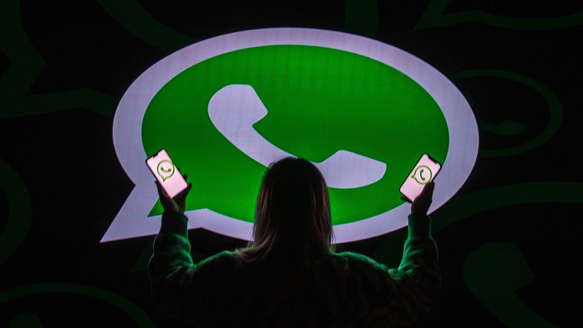 ANKARA, TURKIYE - DECEMBER 5: In this photo illustration, logos of WhatsApp are displayed on a mobile phone screen and computer screen Ankara, Turkiye on December 5, 2023. (Photo by Didem Mente/Anadolu via Getty Images)