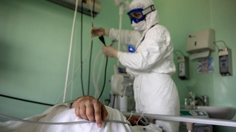 GROZNY, RUSSIA - JUNE 10, 2020: A medical staff member at work in an intensive care unit for COVID-19 patients at Ependiyev Republican Clinical Hospital. Yelena Afonina/TASS (Photo by Yelena Afonina\TASS via Getty Images)