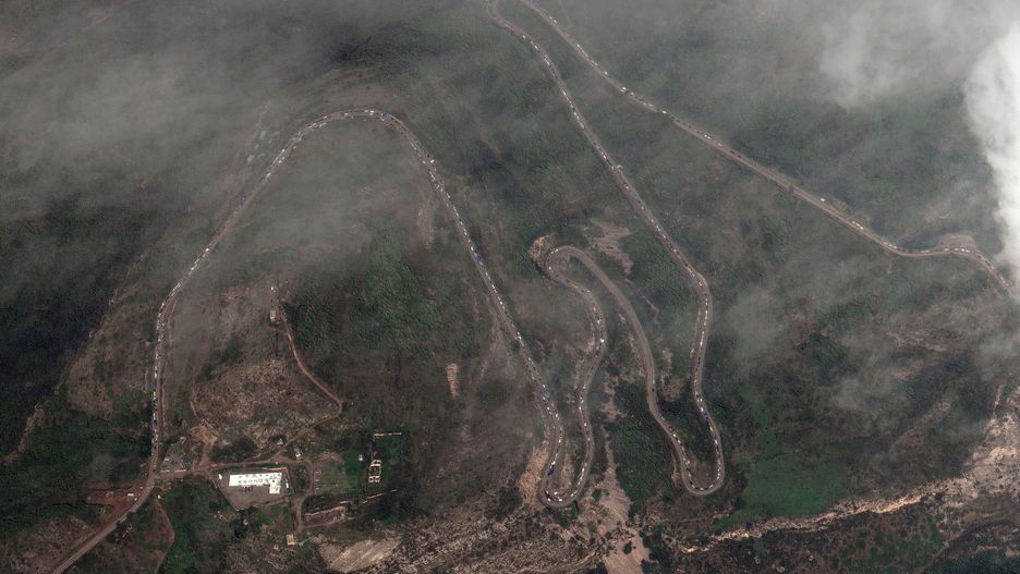 Thousands of ethnic Armenians flee breakaway region of Nagorno-Karabakh
epa10884808 A handout satellite image made available by Maxar Technologies shows ethnic Armenian flee Karabakh for Armenia at the Lachin checkpoint (L) controlled by Russian peackeepers and Azeri border guards, Azerbaijan, 26 September 2023. Azerbaijan on 19 September 2023 launched a brief military offensive on the contested region of Nagorno-Karabakh, a breakaway enclave that is home to some 120,000 ethnic Armenians. Following a ceasefire agreed on 20 September 2023, Azerbaijan opened all checkpoints with Armenia for the unimpeded exit of civilians from the disputed territory. The Armenian government announced the evacuation of more than 19,000 local residents from Nagorno-Karabakh, and a humanitarian center has been set up in the village of Kornidzor near the so-called Lachin corridor, the main route between Armenia and the breakaway region.  EPA/MAXAR TECHNOLOGIES HANDOUT  HANDOUT EDITORIAL USE ONLY/NO SALES 
Dostawca: PAP/EPA.
MAXAR TECHNOLOGIES HANDOUT