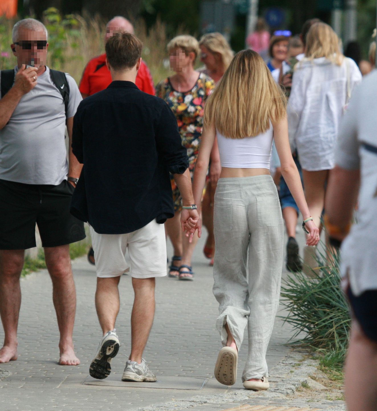 Maciej Musiał z partnerką