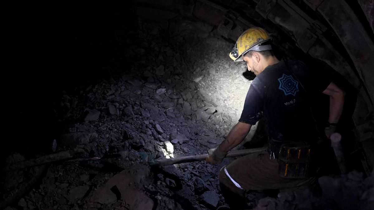 MANISA, TURKIYE - MARCH 27: Miner is seen at mine site, one of Turkiye's major lignite coal production centers, during the holy month of Ramadan in Soma district of Manisa, Turkiye on March 25, 2023. About 500 miners in the mining company returned to the mine site on after participating in search and rescue operation following 7.7 and 7.6 magnitude earthquakes hit multiple provinces of Turkiye occurred on Feb. 06. The miners, who work hundreds of meters below the site according to their shifts, also fulfill the requirements of the holy month of Ramadan despite their difficult professions. According to their working hours, they spend their iftar (breaking the fasting) and sahur (pre-dawn) together. (Photo by Mahmut Serdar Alakus/Anadolu Agency via Getty Images)