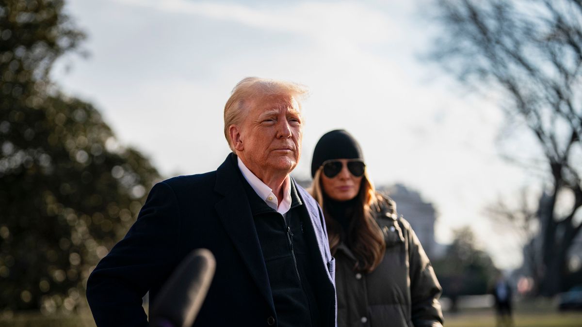 US First Lady Melania Trump, right, watches as President Donald Trump speaks to members of the media on the South Lawn of the White House before boarding Marine One in Washington, DC, US, on Friday, Jan. 24, 2025. Trump will head to Los Angeles to survey wildfire damage after visiting North Carolina, which was recently hit by hurricanes. Photographer: Al Drago/Bloomberg via Getty Images
