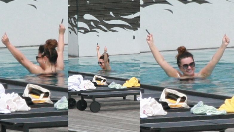 Beata Tadla z mężem w basenie