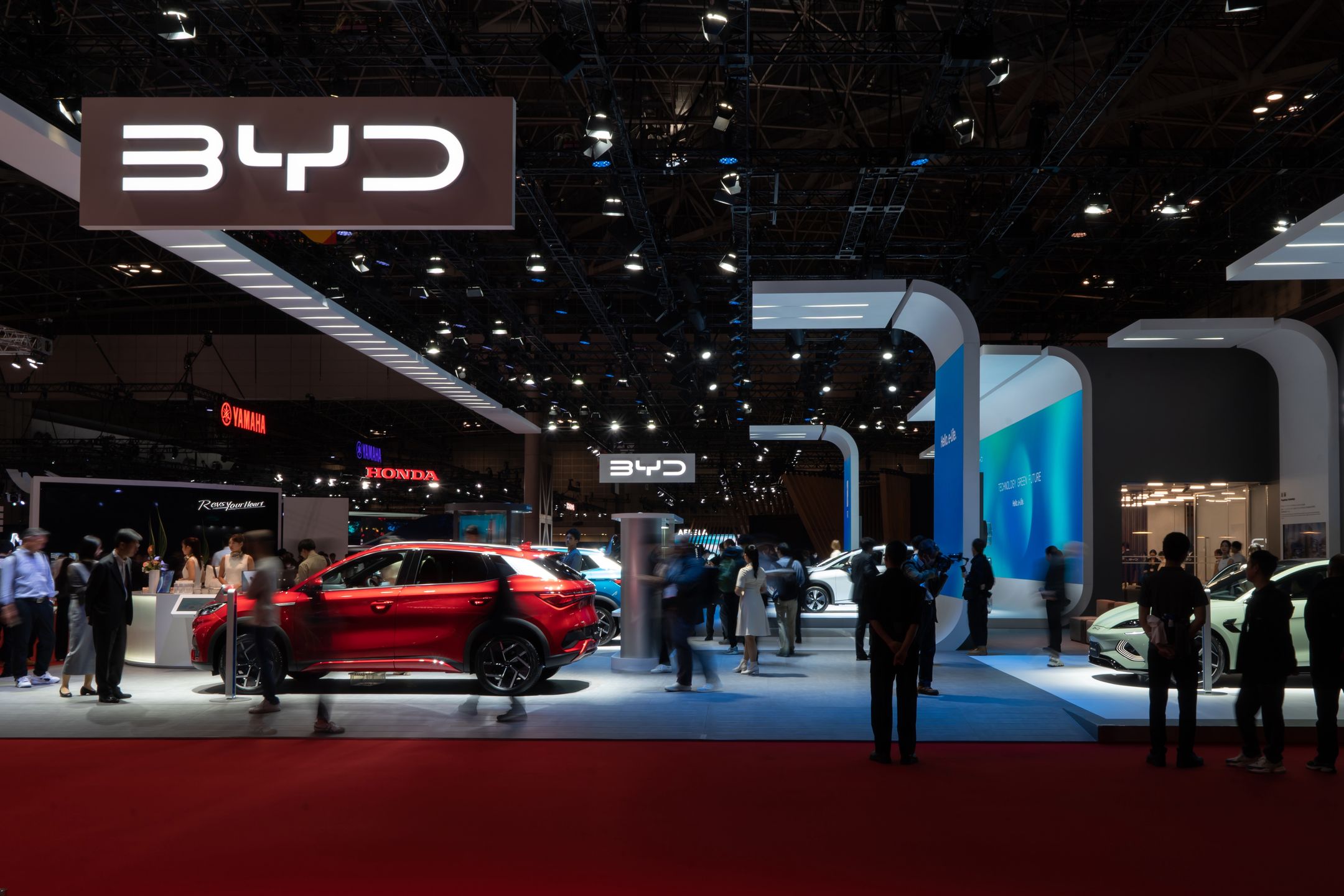 TOKYO, JAPAN - OCTOBER 26: Vehicles are displayed in the BYD booth during the Japan Mobility Show at Tokyo Big Sight in Tokyo, Japan on October 26, 2023. The show, formally known as the Tokyo Motor Show, will be held until November 05.  (Photo by Tomohiro Ohsumi/Getty Images)