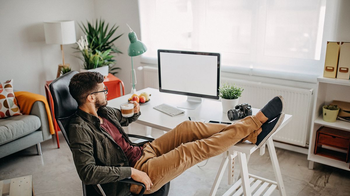 Casual business men working from home and drinking coffee