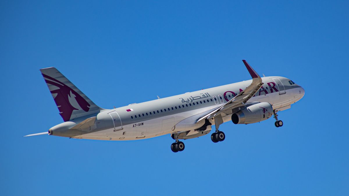 Qatar Airways Airbus A320 aircraft as seen during takeoff phase departing from Mykonos Island airport JMK towards Doha. The Greek island of Myconos is a popular glamorous Mediterranean travel destination for holidays in the Cyclades, the Aegean Sea with the iconic whitewashed buildings, the sandy beaches and famous party at the beach bars. Mykonos island, Greece on October 10, 2021 (Photo by Nicolas Economou/NurPhoto via Getty Images)