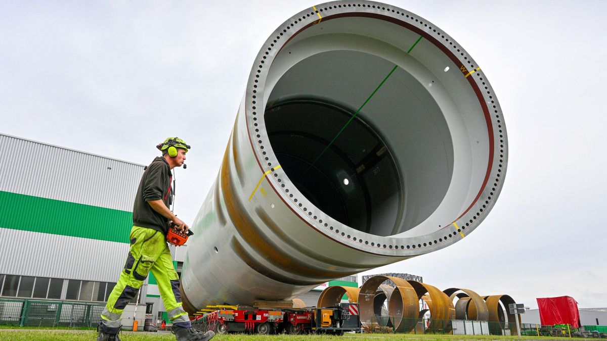 ROSTOCK, GERMANY - SEPTEMBER 22: This picture shows the transport of wind turbine foundations in the Rostock seaport on September 22, 2023, in Rostock, Germany. A view of the premises of the company EEW Special PipeConstructions GmbH in the Rostock seaport. A monopile, which forms the foundation of the wind turbines, is prepared for transport to a wind farm. EEW will shortly open another pipeline plant on the US Baltic Sea coast in the state of New Jersey. Currently, an offshore wind farm north of Ruegen Island is under construction and is expected to be completed in 2024. (Photo by FrankSoellner/GettyImages)