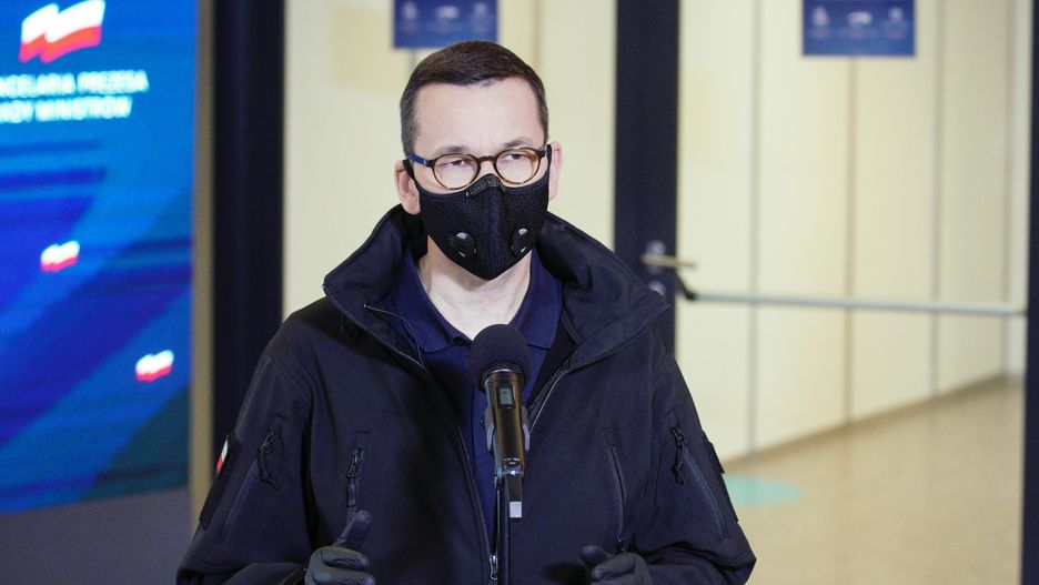 Prime Minister Mateusz Morawiecki is seen during a press conference at the temporary field hospital in the National Stadium in Warsaw, Poland on October 29, 2020. Prime Minister Mateusz Morawiecki together with Minister of Healt Adam Niedzielski and medical director Artur Zaczynski on Thursday visited the field hospital at the National Stadium in Warsaw. The temporary hospital will provide 500 beds to COVID-19 patients to help alleviate demands on regular hospitals amid shaprly rising cases of infections. (Photo by Jaap Arriens/NurPhoto via Getty Images)