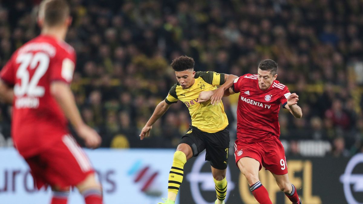 Jadon Sancho (z lewej) oraz Robert Lewandowski (z prawej)