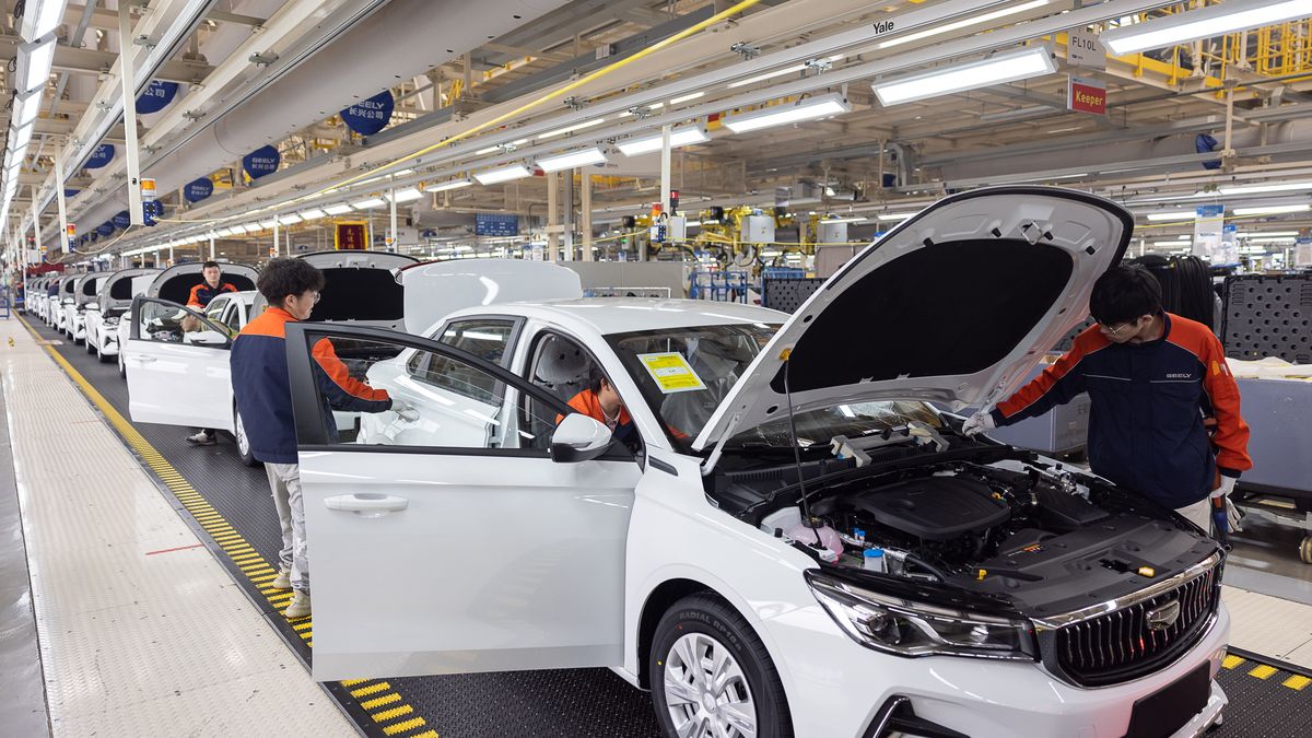 CHANGXING, CHINA - MARCH 31: Employees work on the assembly line of Emgrand Sedan at Geely Auto's Changxing Plant on March 31, 2023 in Changxing County, Huzhou City, Zhejiang Province of China. (Photo by Yi Fan/VCG via Getty Images)