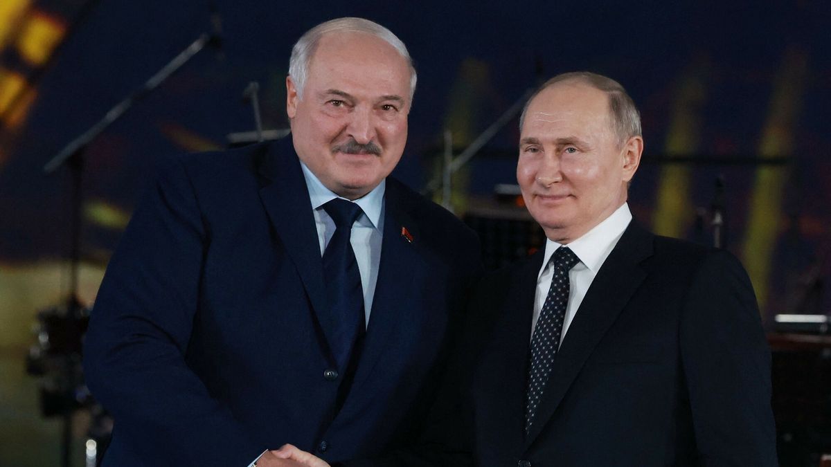 Temporary
In this pool photograph distributed by Russian state agency Sputnik, Russia's President Vladimir Putin (R) shakes hands with Belarus' President Alexander Lukashenko (L) during a concert at the Gazprom Arena stadium in Saint Petersburg on January 27, 2024, as part of events marking the 80th anniversary of the liberation of Leningrad from Nazi blockade during WWII. (Photo by Vyacheslav PROKOFYEV / POOL / AFP)
VYACHESLAV PROKOFYEV
