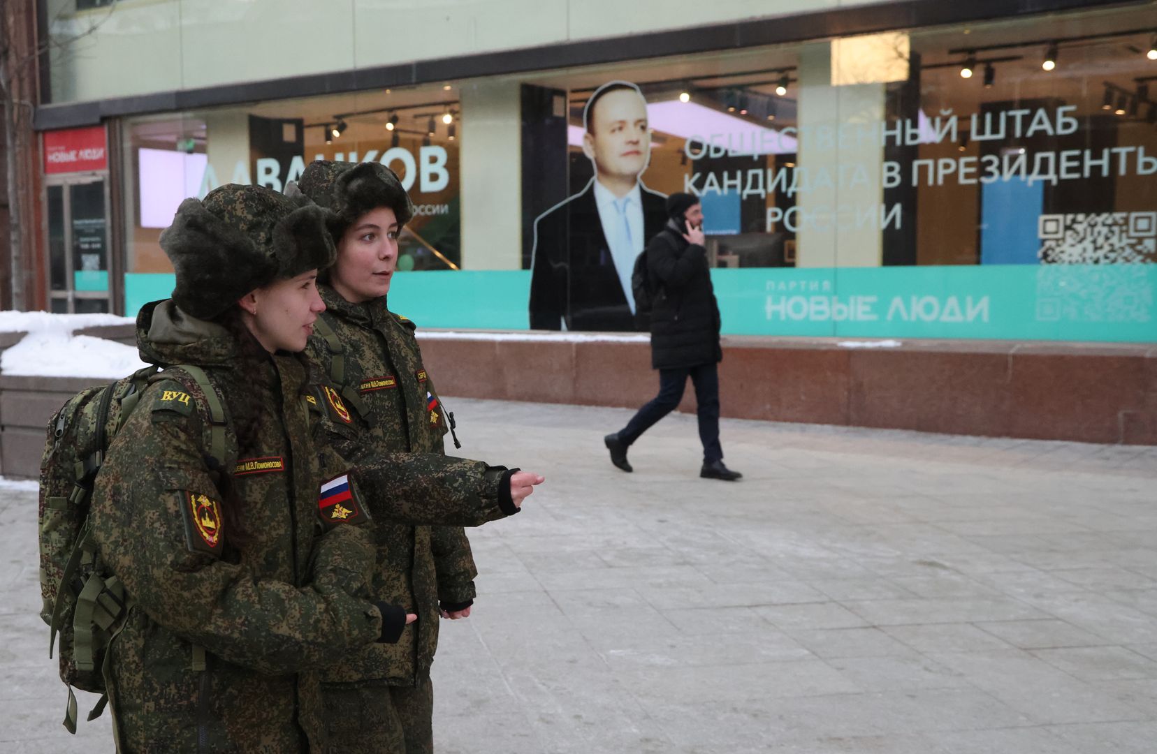 Russia Daily LifeMOSCOW, RUSSIA - FEBRUARY 9: (RUSSIA OUT) Russian military students walks past the elections headquarters of Vladislav Davankov, a candidate for Presidency, February 9, 2024 in Moscow, Russia. All four registred cadidates for the 2024 Presidential Elections - Vladislav Davankov, Vladimir Putin, Nikolay Kharitonov and Leonid Slutsky are suupporters of the military invasion of Ukraine. (Photo by Contributor/Getty Images)Contributor