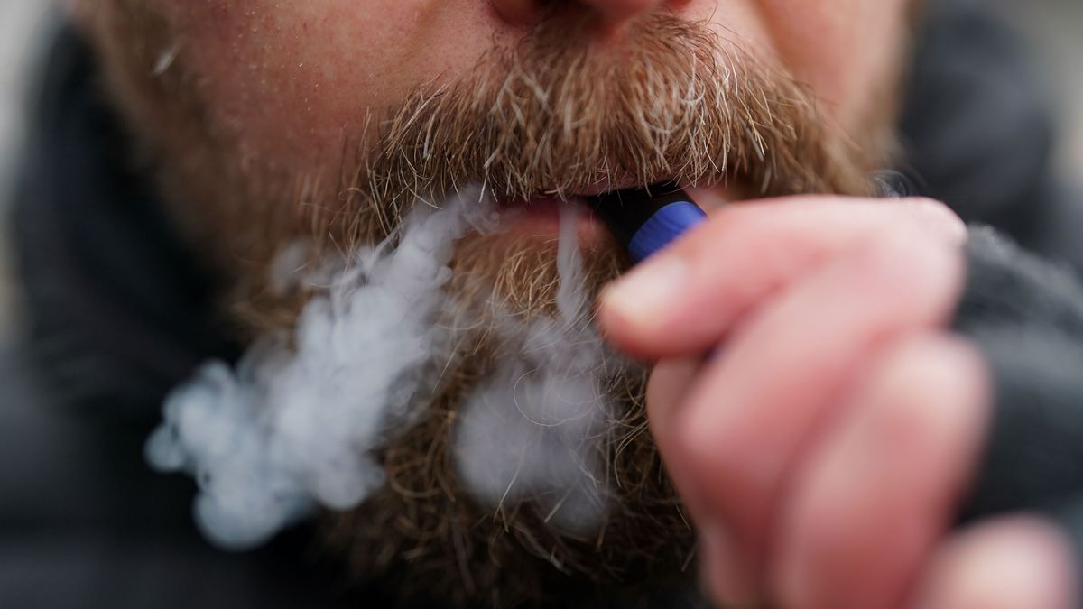 A man using a disposable vape. The government is set to ban disposable vapes as part of plans to tackle the rising number of young people taking up vaping. Picture date: Monday January 29, 2024. (Photo by Jacob King/PA Images via Getty Images)