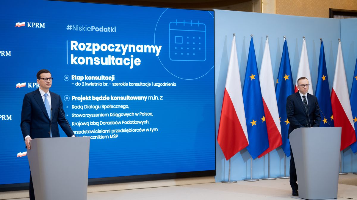 Polish Prime Minister Mateusz Morawiecki and Deputy Finance Minister Artur Sobon during a press conference in Warsaw, Poland, on March 24, 2022 (Photo by Mateusz Wlodarczyk/NurPhoto via Getty Images)