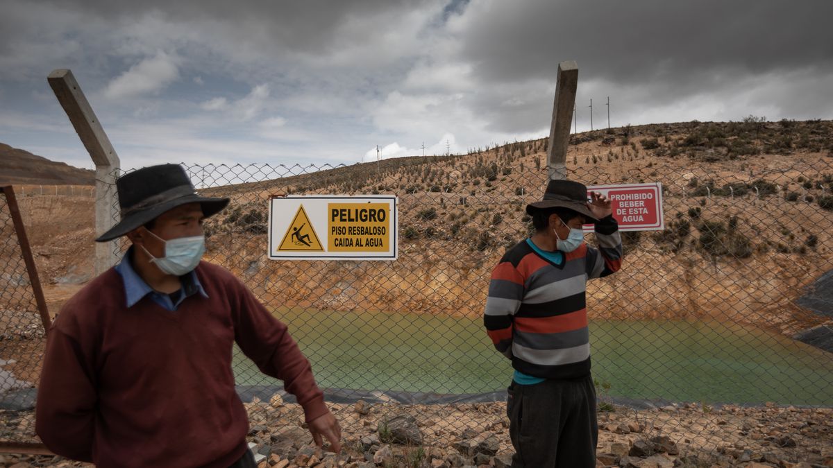 Andean community residents enter the Apumayo open pit gold mine in Chavina, Ayacucho, Peru, on Thursday, Dec. 2, 2021. Activists want to shut mines they say pollute and desecrate, while Castillo's government is caught between its base and the economy. Photographer: Angela Ponce/Bloomberg via Getty Images