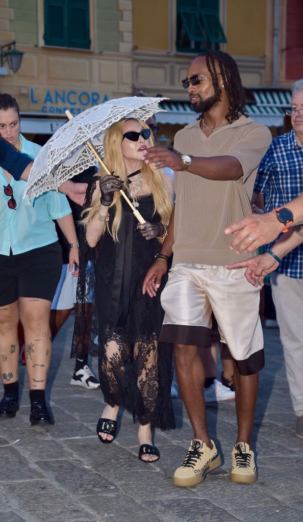 Madonna in Italy with a much younger guy