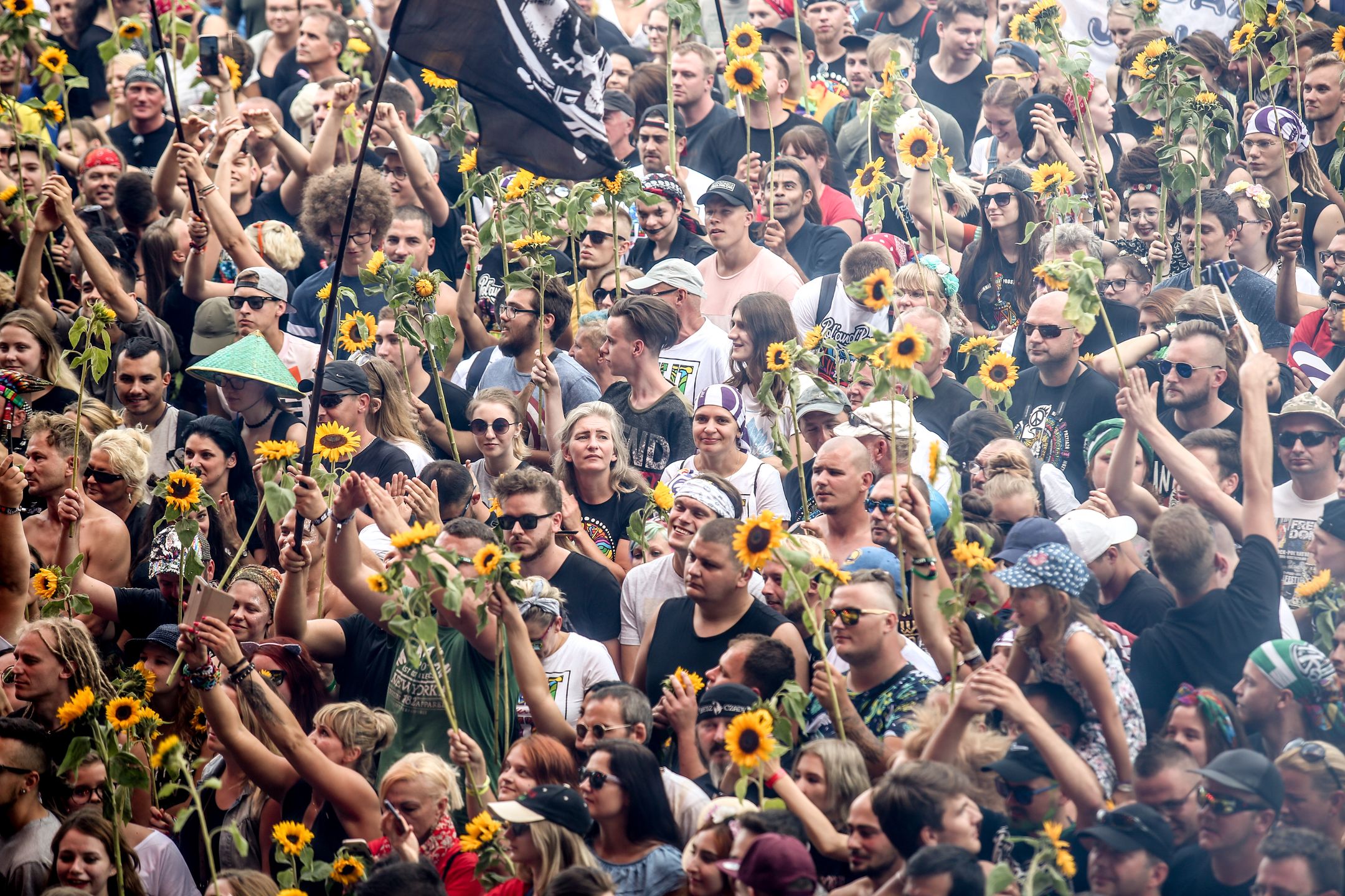 Public cheers during the opening ceremony of the PolandRock open-air music festival in Kostrzyn at Odra, Poland on August 1, 2019. Over 200 000 people is expected to participate in the festival making it one of the biggest music festivals in Europe. (Photo by Dominika Zarzycka/NurPhoto via Getty Images)