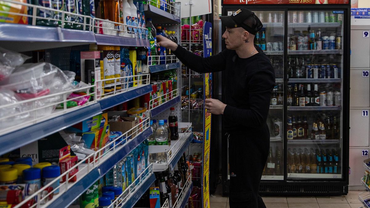 KHARKIV, UKRAINE - 2022/04/17: A staff member at a grocery store is putting replacement items on a shelf in Kharkiv. Russia has re-supplied its troops and concentrated the offensive on the eastern part of Ukraine. The second biggest city in Ukraine, Kharkiv, is now under constant threat of Russian bombardment and airstrikes. (Photo by Alex Chan Tsz Yuk/SOPA Images/LightRocket via Getty Images)