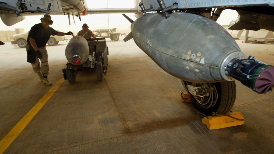 U.S. Air Force Waits For Flight Conditions To Improve
AIR BASE, KUWAIT - MARCH 27:  A U.S. Air Force weapons unit moves a 500 lb Guided Bomb (G.B.U) onto an A-10 fighter March 27, 2003 on an air base in Kuwait. Flights were delayed in the afternoon for a second day due to poor visability as Operation Iraqi Freedom continues with a strategic air campaign.  (Photo by Paula Bronstein/Getty Images)
Paula Bronstein
A- 10 wind sky skies sand storm plane jet Iraq conflict Air base