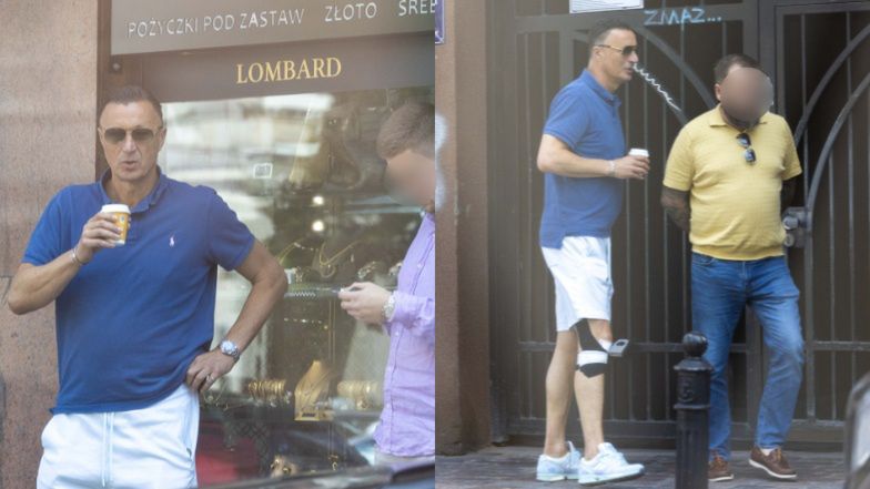 Tomasz Hajto delektuje się papierosem przed lombardem