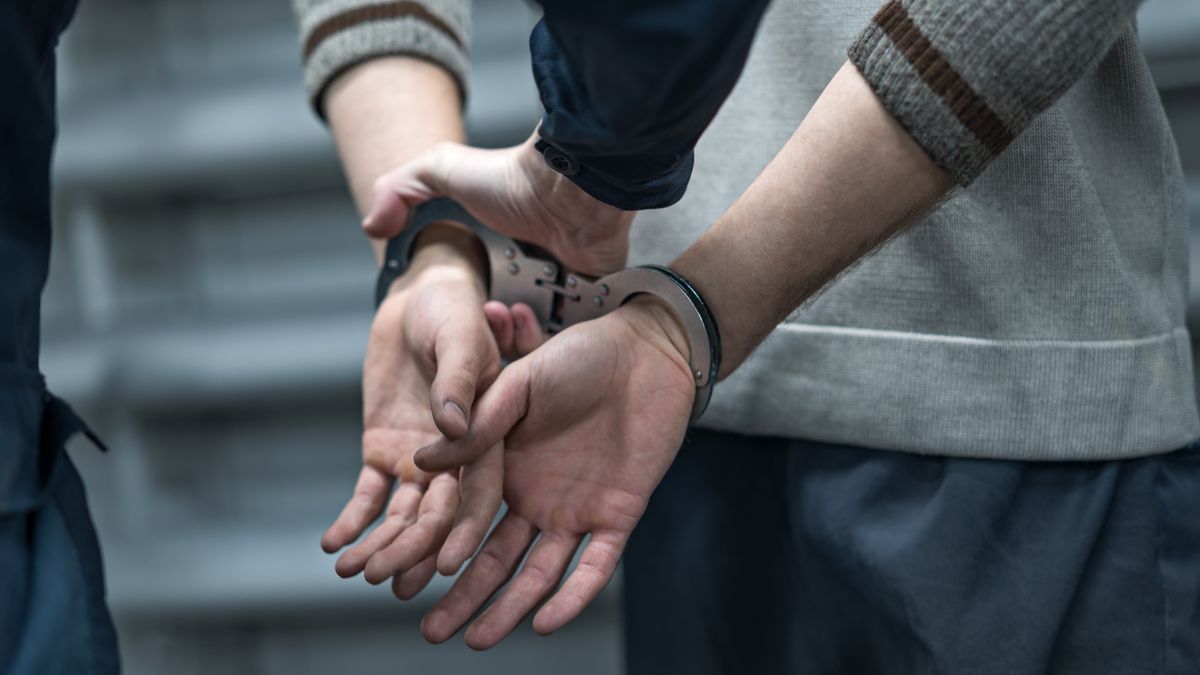 handcuffing the arrested person. Implementation of the arresthandcuffs on the prisoner. Making an arrest. Remand in custodyhandcuffs, arrest, hand, man, crime, criminal, prisoner, hostage, justice, convicted, prison, punishment, freedom, law, gangster, concept, violence, outlaw, social, adult, metal, background, desperation, caught, defense, thief, security, illegal, arrested, handcuffs, arrest, hand, man, crime, criminal, prisoner, hostage, justice, convicted, prison, punishment, freedom, law, gangster, concept, violence, outlaw, social, adult, metal, background, desperation, caught, defense, thief, security, illegal, arrested