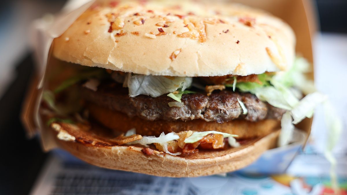 Polish winter season burger named Burger Drwala is seen in this illustration photo taken in McDonald's restaurant in Poland on November 24, 2024. (Photo by Jakub Porzycki/NurPhoto via Getty Images)