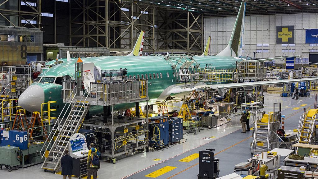 Boeing's New No-Drama 737 Jetliner Is Ready For Its Public Debut
The Boeing Co. 737 MAX airplane stands on the production line at the company's manufacturing facility in Renton, Washington, U.S., on Monday, Dec. 7, 2015. Boeing Co.'s latest 737 airliner is gliding through development with little notice, and that may be the plane's strongest selling point. The single-aisle 737 family is the company's largest source of profit, and the planemaker stumbled twice earlier this decade with tardy debuts for its wide-body 787 Dreamliner and 747-8 jumbo jet. Photographer: David Ryder/Bloomberg via Getty Images
Bloomberg
U.S.A, TRANSPORT, JET, Americas, WEST, AIRLINES, PLANE, US, TRANSPORTATION, JETS, MANUFACTURING, North America, NORTHWEST, AVIATION, PLANES, BOEING 737 MAX, MANUFACTURE, JETLINER, BEST PHOTO, AIRLINE INDUSTRY, TRAVELING, TRAVEL, BEST PHOTOS, DEBUT