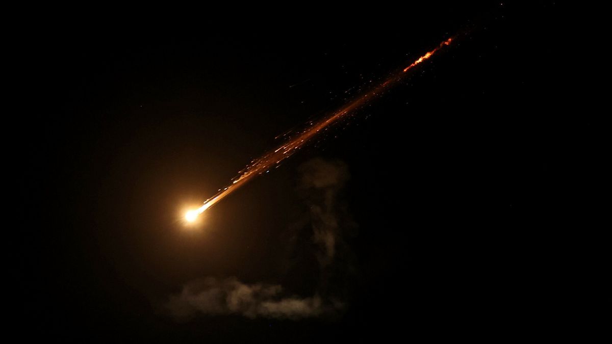 Temporary
This picture shows a trail from an Iranian rocket in the sky above Jerusalem on June 13, 2025. Iran fired a barrage of ballistic missiles at Israel in a counter-strike on June 13, after an unprecedented onslaught hammered the Islamic republic's top military brass and targeted its nuclear facilities and bases. (Photo by AHMAD GHARABLI / AFP)
AHMAD GHARABLI