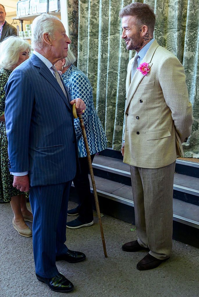 Chelsea Flower Show 2025
LONDON, ENGLAND - MAY 20: David Beckham wearing a David Austin Roses "King's Rose" speaks with King Charles III, patron of the Royal Horticultural Society during a visit to the RHS Chelsea Flower Show at Royal Hospital Chelsea on May 20, 2025 in London, England. (Photo by Paul Grover - WPA Pool/Getty Images)
WPA Pool
