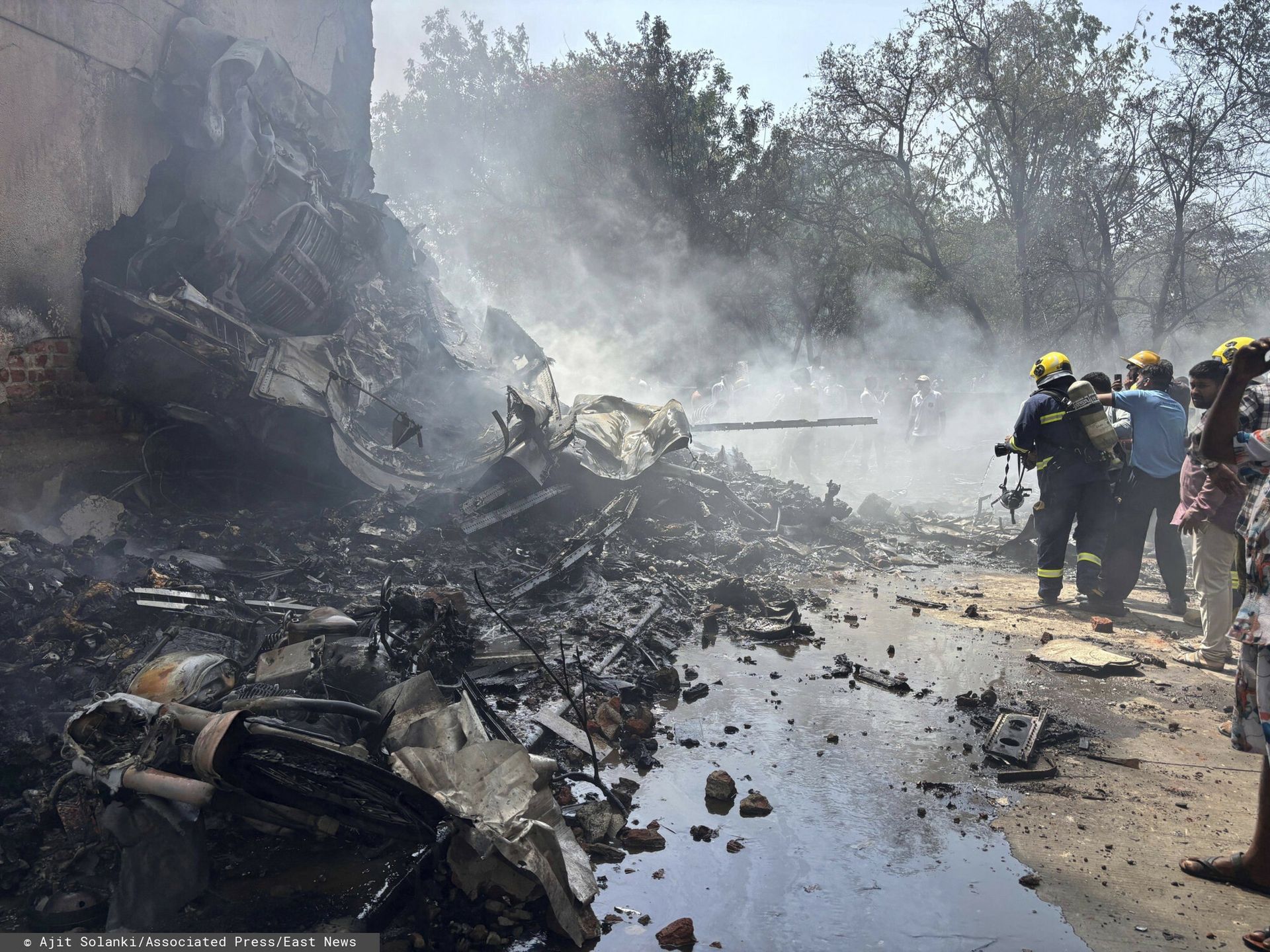 Temporary
Firefighters work at the site of an airplane that crashed in India's northwestern city of Ahmedabad in Gujarat state, Thursday, June12, 2025. (AP Photo/Ajit Solanki)
Ajit Solanki