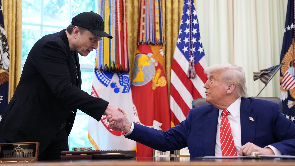 WASHINGTON, DC - MAY 30: Tesla CEO Elon Musk shakes hands with U.S. President Donald Trump as they speak to reporters in the Oval Office of the White House on May 30, 2025 in Washington, DC. Musk, who served as an adviser to Trump and led the Department of Government Efficiency, announced he would leave his role in the Trump administration to refocus on his businesses.  (Photo by Kevin Dietsch/Getty Images)