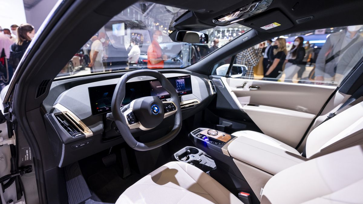 MUNICH, GERMANY - SEPTEMBER 07: A BMW iX car is presented at the BMW stand during the Munich Motor Show IAA Mobility on September 07, 2021 in Munich, Germany. The IAA is taking place for the first time in Munich after traditionally being held in the past every two years in Frankfurt. Due to the ongoing effects of the novel coronavirus pandemic the IAA is taking place in a reduced form, with fewer exhibitors and participants. (Photo by Jan Hetfleisch/Getty Images)