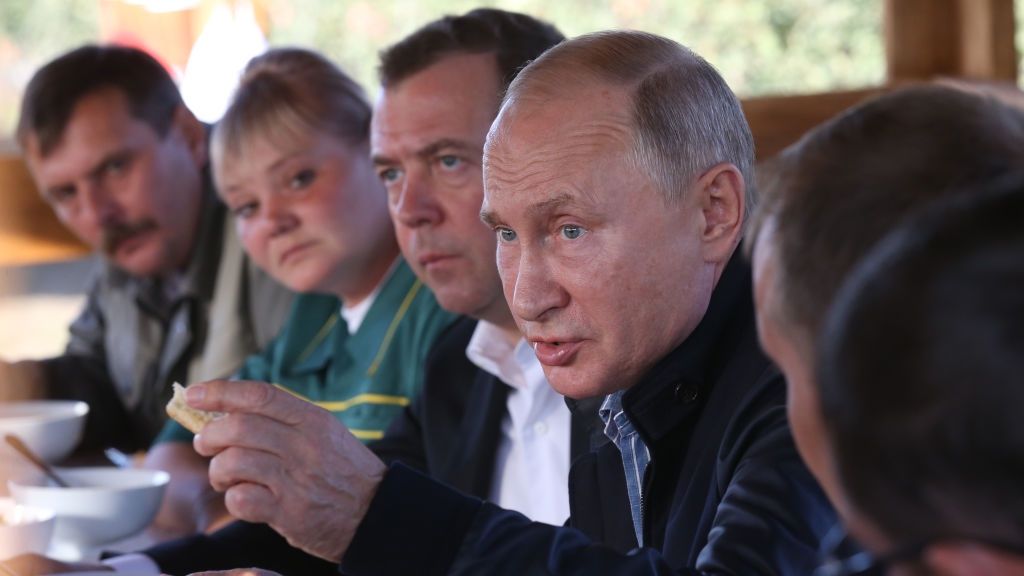 Russian President Vladimir Putin and Prime Minister Dmitry Medvedev visit Stavropol Krai
STAVROPOL KRAI, RUSSIA - OCTOBER,9 (RUSSIA OUT) Russian President Vladimir Putin (C) speeches as Prime Minister Dmitry Medvedev (L) looks on during the lunch while visiting the Rassvet Agricultural Company in Stavropol Krai, Russia, October,9, 2018. Putin and Medvedev are having a one-day joint trip to Stavropol Krai region in Southern part of Russia. (Photo by Mikhail Svetlov/Getty Images)
Mikhail Svetlov