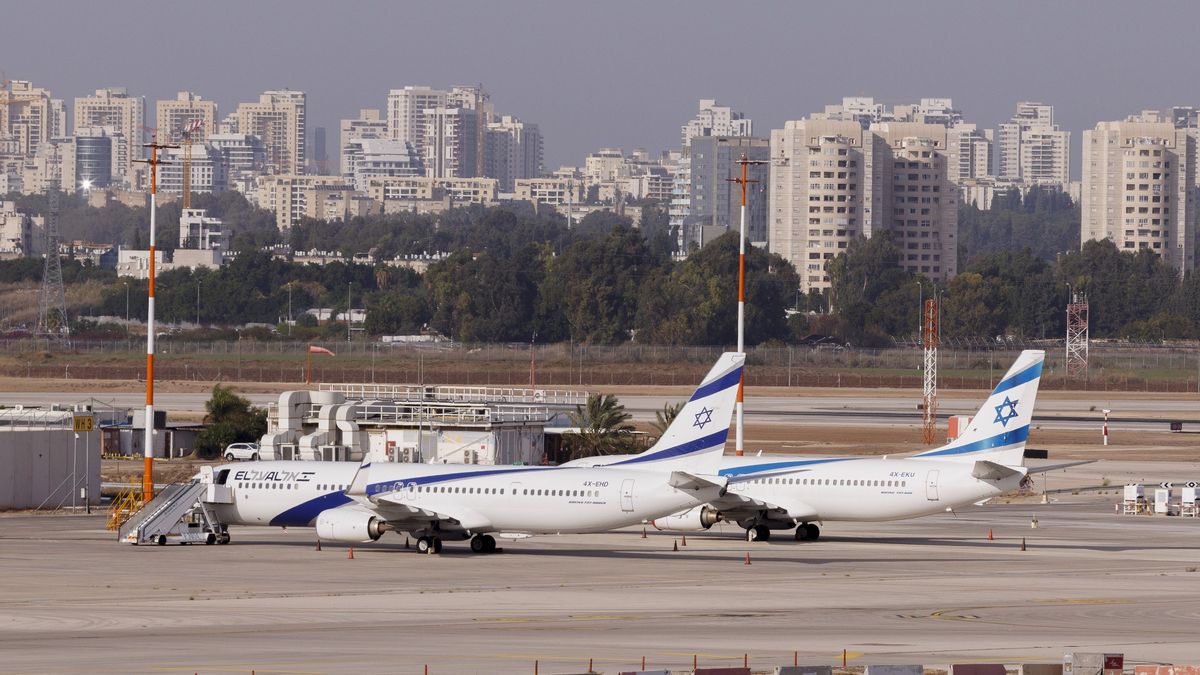 El Al Israel Airlines passenger aircraft on the tarmac at Ben Gurion International airport in Tel Aviv, Israel, on Tuesday, Nov. 30, 2021. Israel is focused on rolling out vaccine booster shots and the country will need a few weeks to reconsider lifting a travel ban on incoming foreigners, the chairman of the country's Covid-19 advisory team said. Photographer: Kobi Wolf/Bloomberg via Getty Images