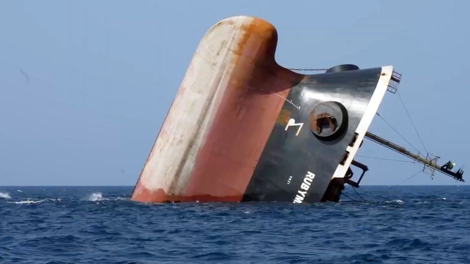 AT SEA - MARCH 7: (EDITORS NOTE: Best quality available) This handout photo provided by Yemeni Al-Joumhouria TV, shows the British-registered cargo ship 'Rubymar' sinking after it was targeted by Yemen's Houthi forces in international waters in the Red Sea, on March 7, 2024, in the Red Sea. (Photo by Al-Joumhouriah channel via Getty Images)