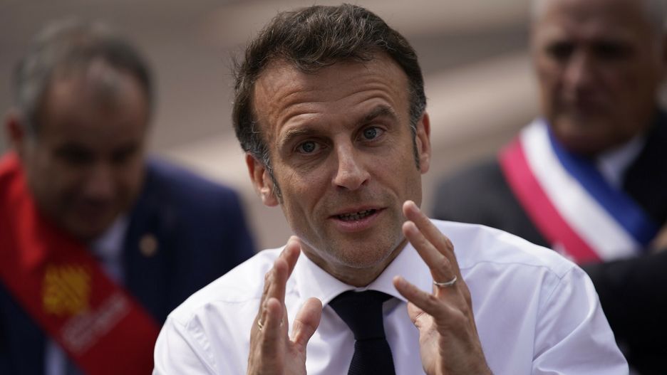 Temporary
French President Emmanuel Macron speaks to school children, parents and teachers as he visits a middle school, Thursday, April 20, 2023 in Ganges, southern France. Emmanuel Macron's trip to Ganges comes amid a concerted new effort by him and his government to put the furor caused by the pension change behind him. (AP Photo/Daniel Cole, Pool)
Daniel Cole